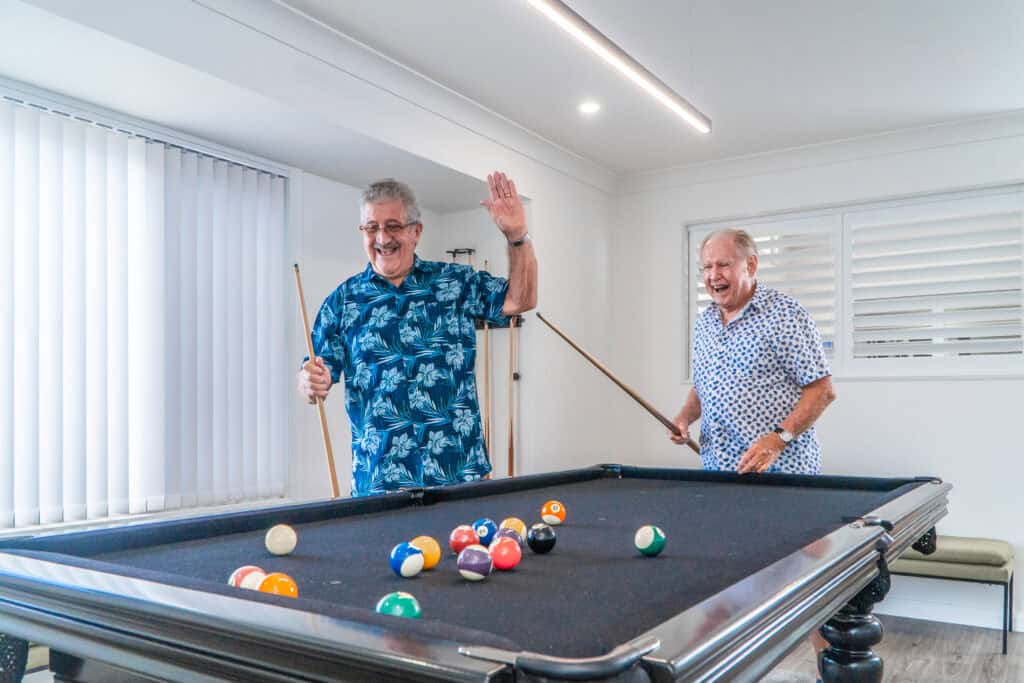 Seniors enjoying games in the communal spaces of one of our Toowoomba retirement villages