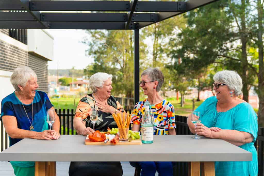 Seniors enjoying time outside at Oak Tree Retirement Villages Newcastle