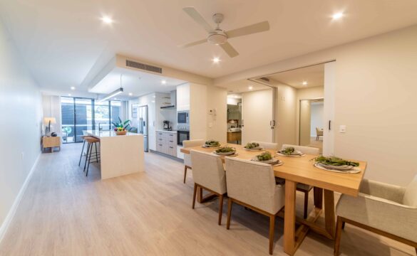 Open plan kitchen, dining area in one of our Oak Tree Retirement village apartments.