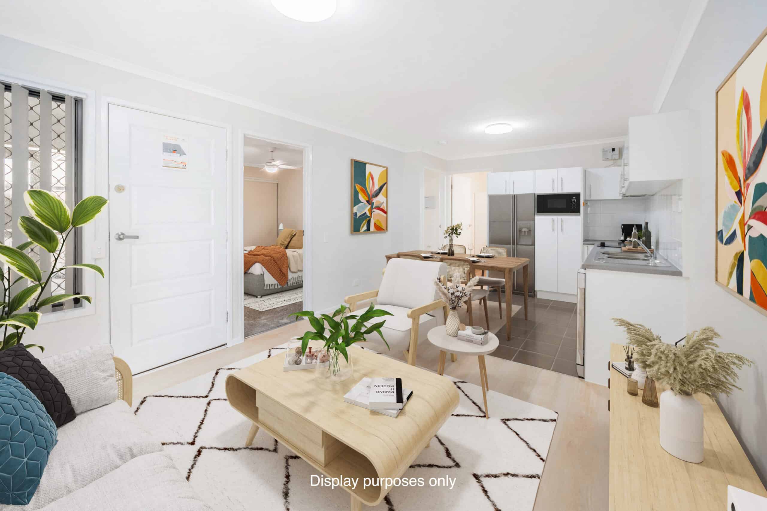 Open plan kitchen, dining, living area in on of our Oak Tree Goodna properties.