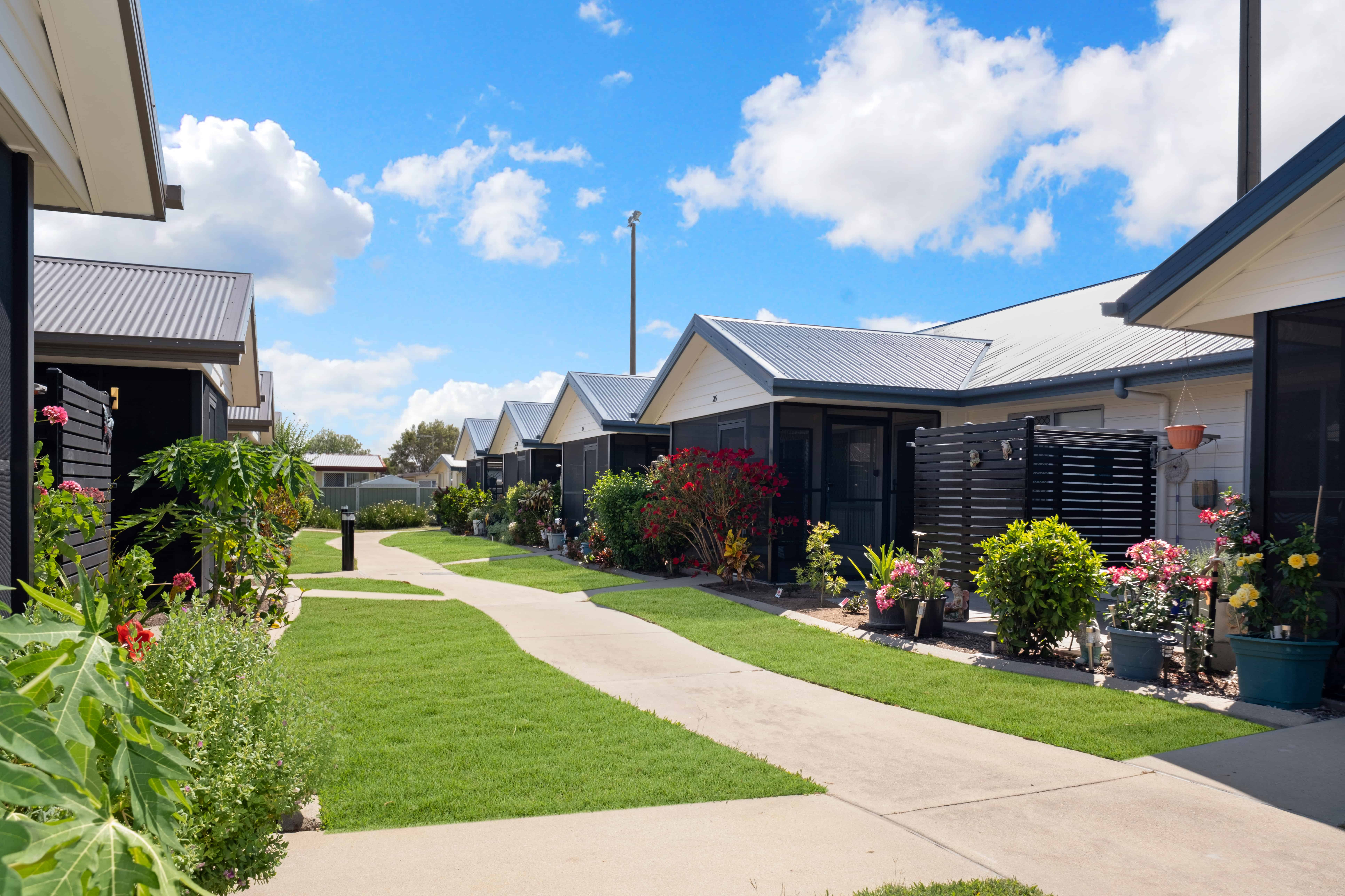 Beautiful homes and well manicured outdoor spaces at Oak Tree Park Avenue