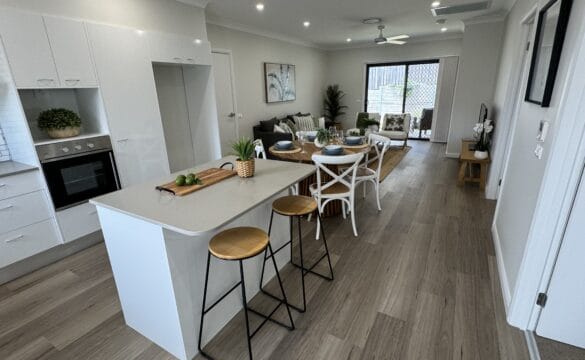 Inside the open plan kitchen, dining and living area of Moss Vale Villa 19 at Oak Tree Retirement Village