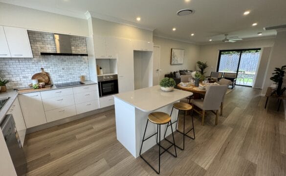 Inside the open plan kitchen, dining and living area of Moss Vale Villa 8 at Oak Tree Retirement Village