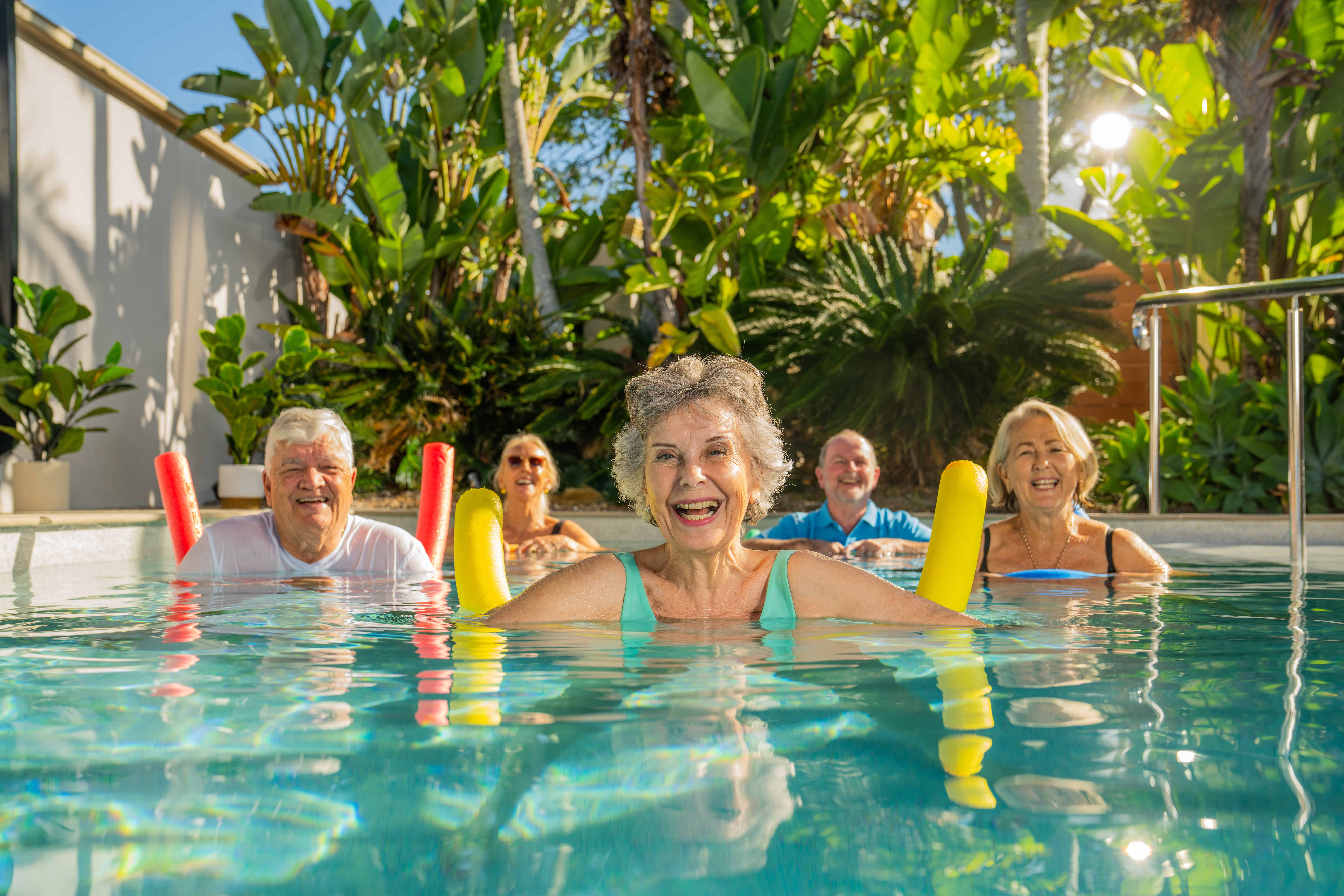 Seniors enjoying activities in the pool at one of our retirement villages