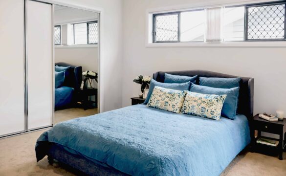 Large, light filled bedroom with built in storage in one of our Oak Tree Moss Vale Thorne Villas