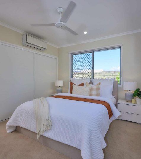 Clean modern bedroom with built in wardrobes in one of our Oak Tree Retirement Village Cairns Villas