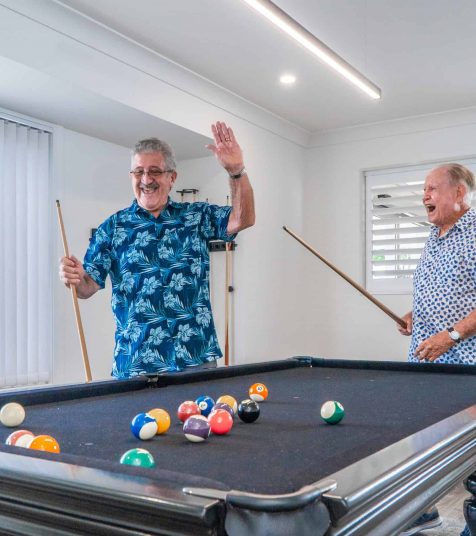 Senior men celebrating and having a good time at Coffs Harbour retirement village