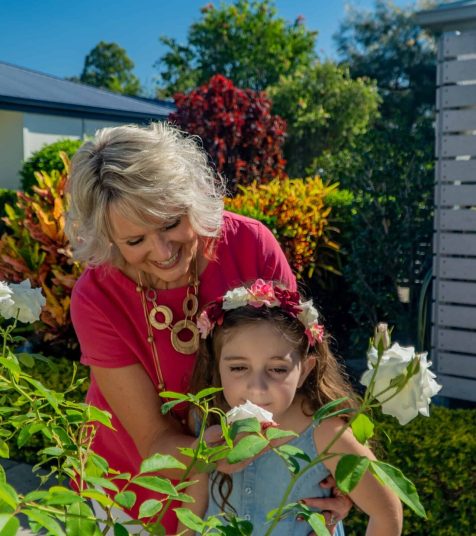 Senior woman and grandchild enjoying the gardens at one of our Oak Tree Retirement Villages in Brisbane