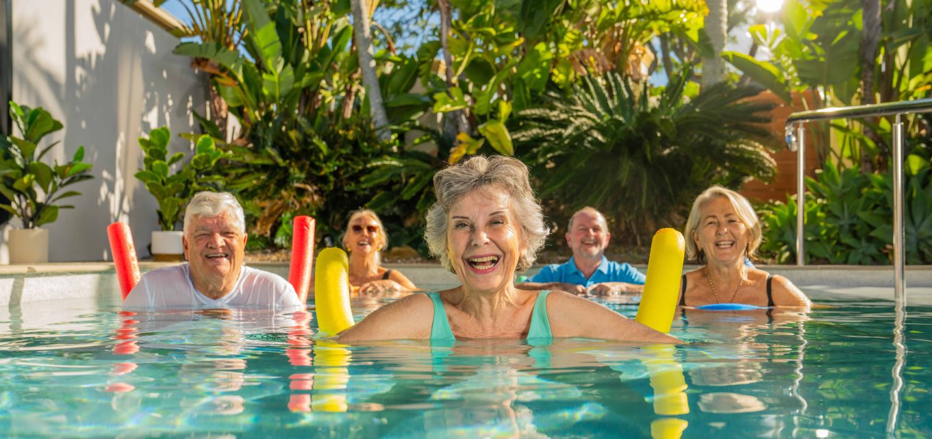 Seniors enjoying pool activities at one of our retirement villages