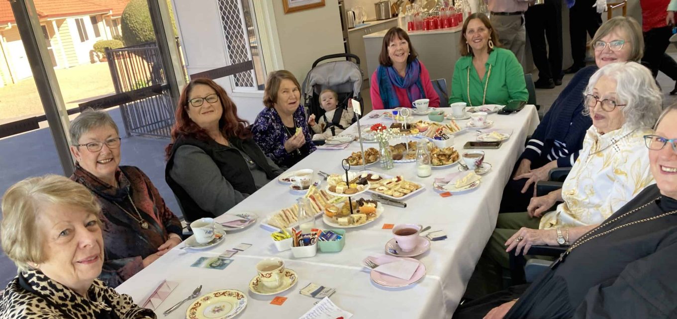 Seniors enjoying high tea event