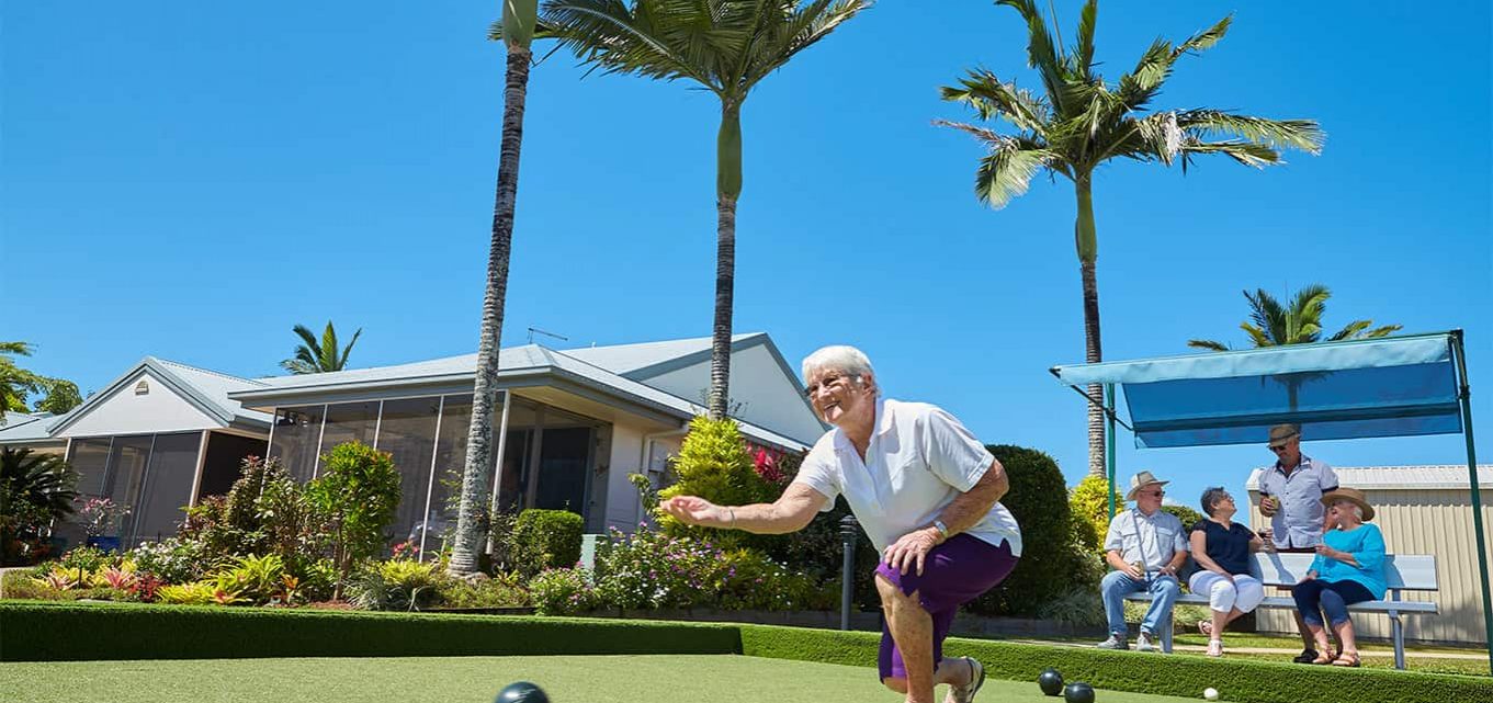 Senior residents of Oak Tree Retirement Village enjoying a game of lawn bowls